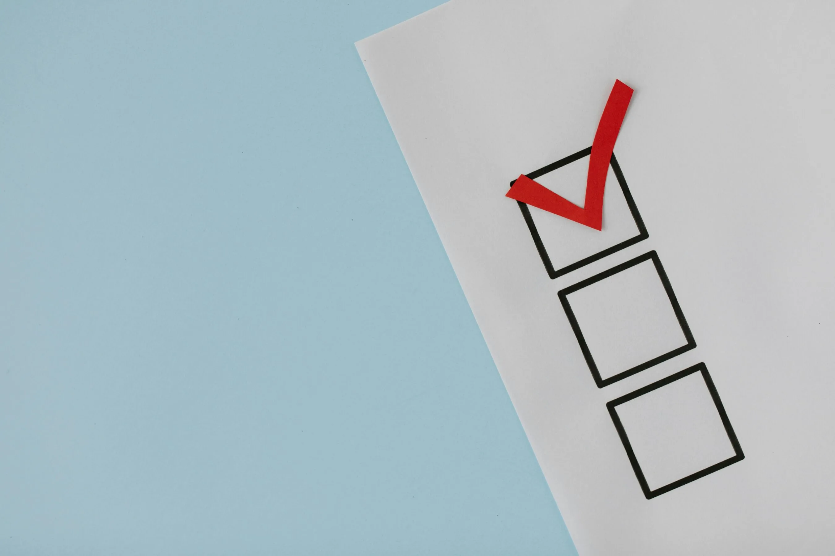 Checkbox met een rood vinkje in de bovenste box